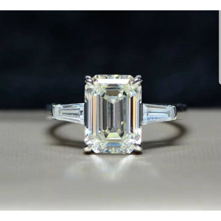 Brilliant Emerald Cut Cubic Zirconia Three Stone Ring