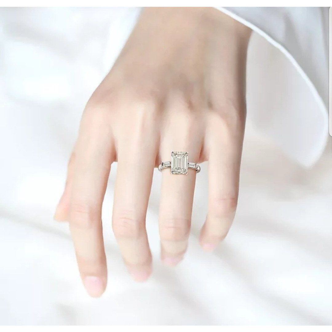 Brilliant Emerald Cut Cubic Zirconia Three Stone Ring