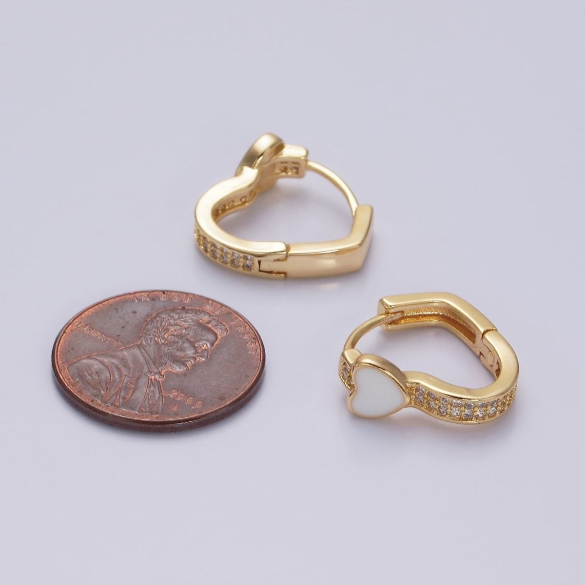 16K Gold Filled Heart White Enamel Micro Paved CZ 15.7mm Huggie Earrings in Gold & Silver