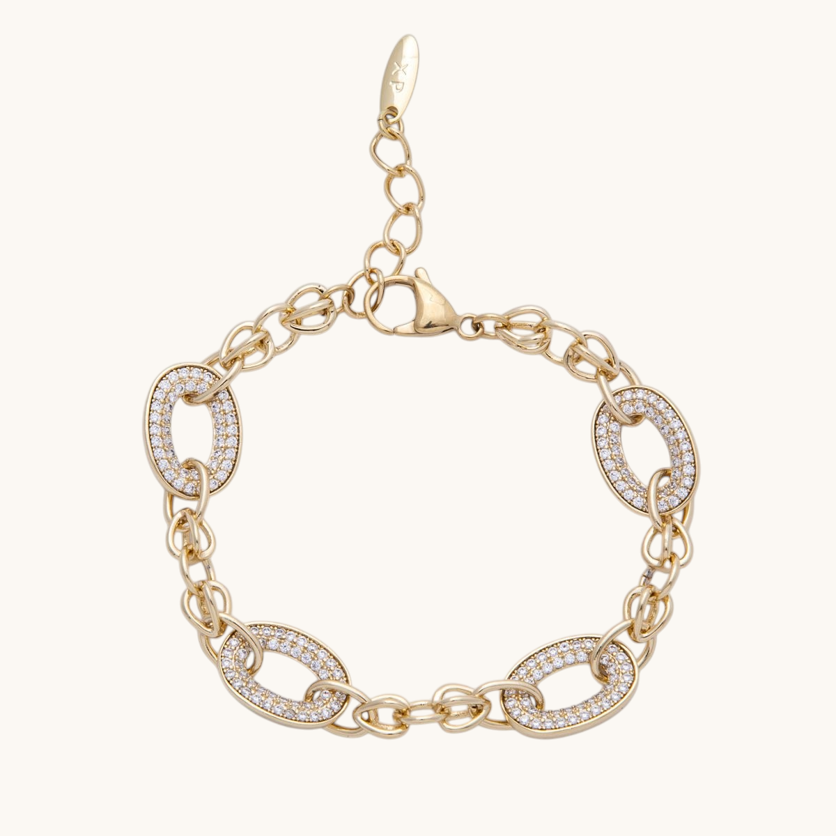 Tessa Vera 14K gold-filled cable chain bracelet featuring oval links with clear micro-paved cubic zirconia stones.
