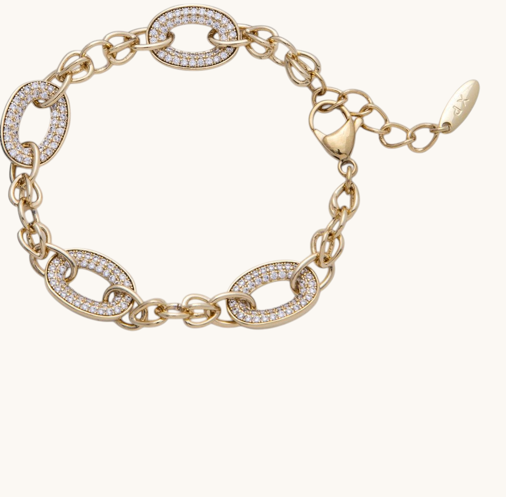 Tessa Vera 14K gold-filled cable chain bracelet featuring oval links with micro-paved clear cubic zirconia stones.