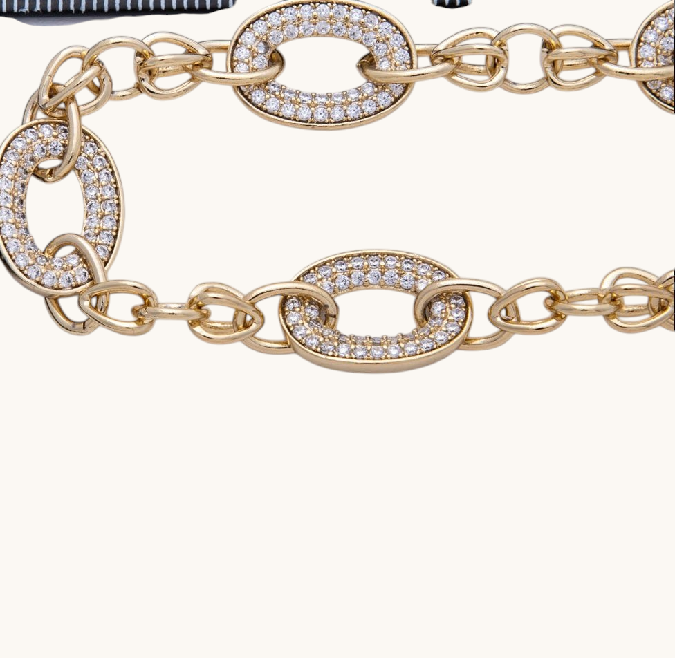 Tessa Vera 14K gold-filled paperclip chain necklace featuring oval links with micro-paved clear cubic zirconia stones