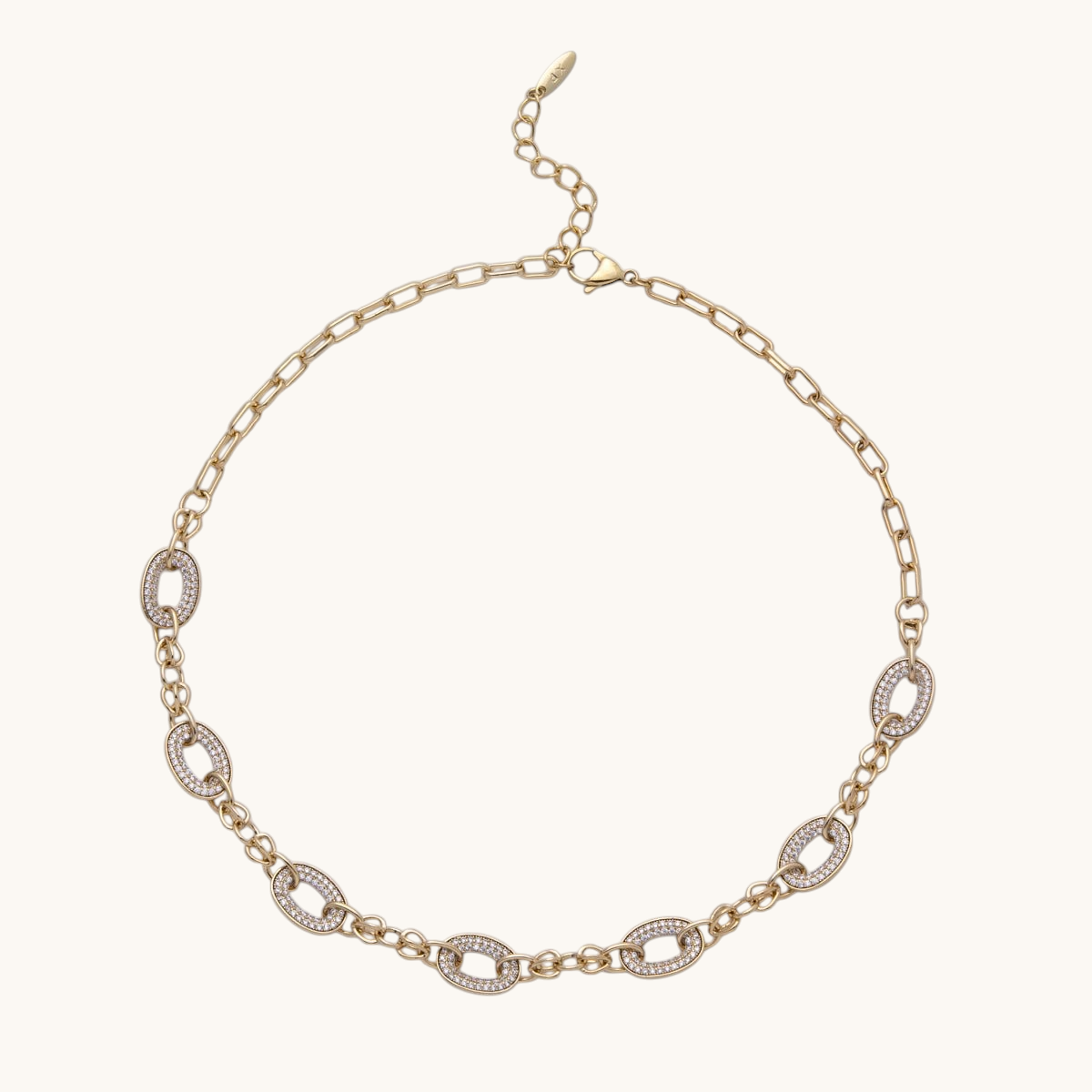 Tessa Vera 14K gold-filled paperclip chain necklace featuring oval micro-paved cubic zirconia links and lobster clasp.