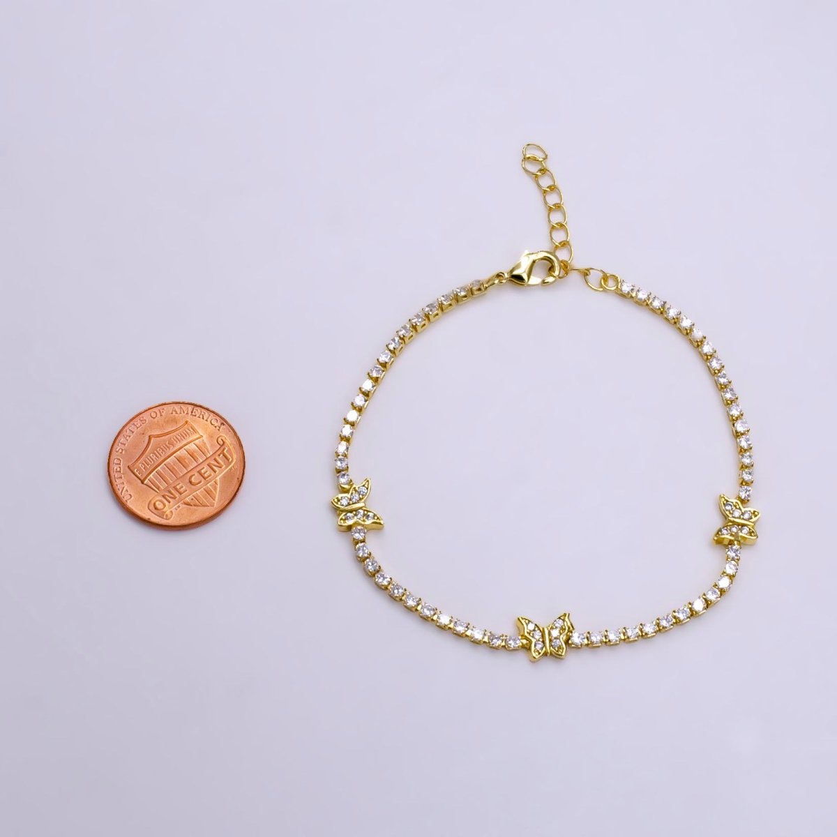 14K Gold Filled Clear Micro Paved CZ Butterfly Tennis Chain 6.7 Inch Bracelet in Gold & Silver