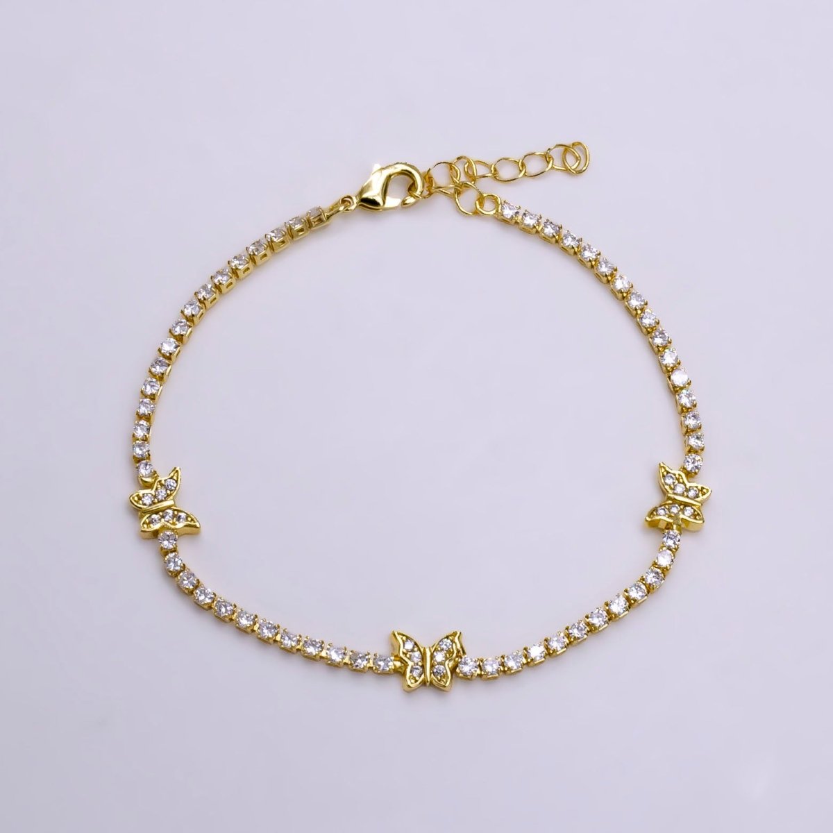14K Gold Filled Clear Micro Paved CZ Butterfly Tennis Chain 6.7 Inch Bracelet in Gold & Silver